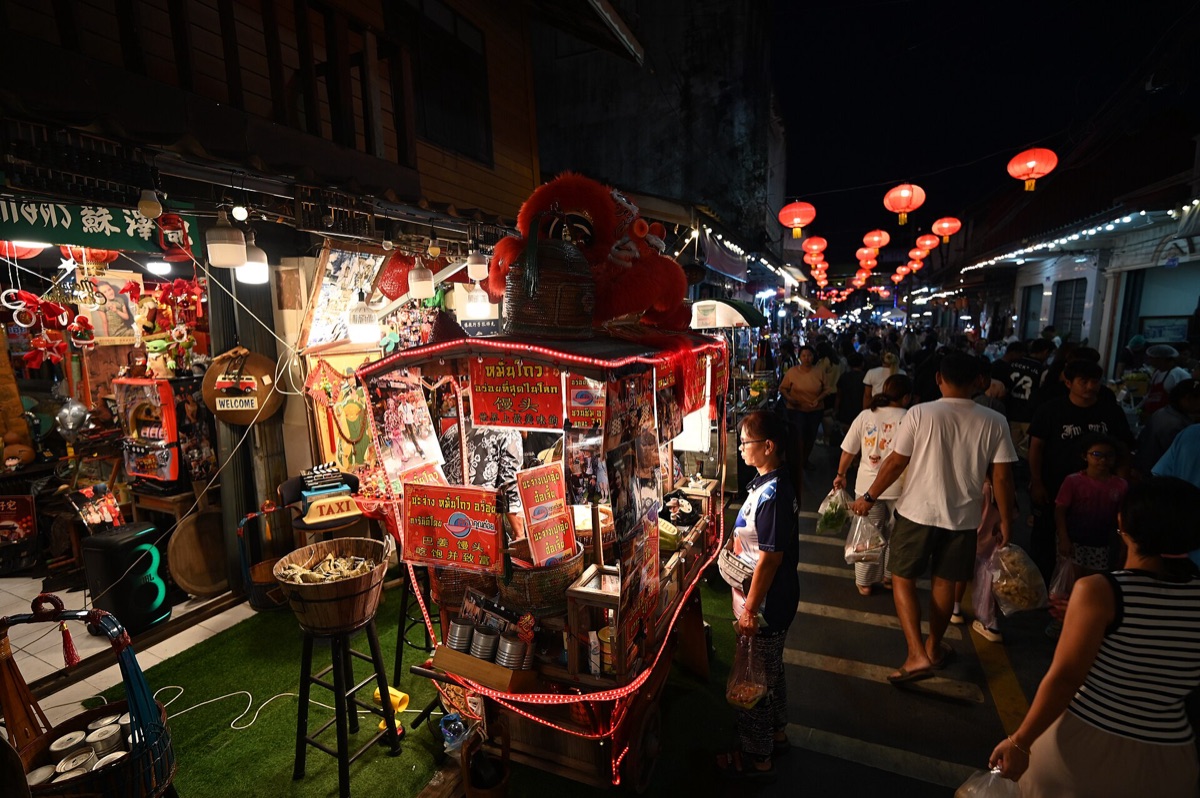 Bustling traditional night market stalls in Taiwan with various food vendors